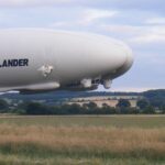 The airlander flying above an airfield